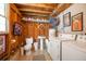 Rustic laundry room featuring sports memorabilia, a utility sink, and a washer/dryer at 4310 W San Luis St, Tampa, FL 33629