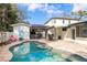 Backyard pool with an outdoor kitchen and ample patio space at 4310 W San Luis St, Tampa, FL 33629