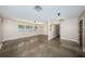 Spacious living room with polished floors and ample natural light at 4807 Wynwood Dr, Tampa, FL 33615