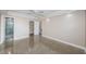 Spacious bedroom with en suite bathroom and walk-in closet access at 4807 Wynwood Dr, Tampa, FL 33615