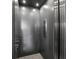 Modern elevator with sleek metal interior and functional control panel at 58 Inness Dr, Tarpon Springs, FL 34689