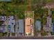 Overhead view of a home with a detached garage, a well-kept yard, and a desirable neighborhood setting at 605 12Th N Ave, St Petersburg, FL 33701