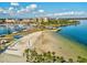 Beautiful aerial view of beach with clear water and city skyline in St. Petersburg, Florida at 605 12Th N Ave, St Petersburg, FL 33701