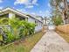 Charming home with a detached garage and a well-maintained yard, offering a serene and picturesque setting at 605 12Th N Ave, St Petersburg, FL 33701