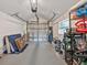 Spacious garage interior with overhead door and ample storage racks at 605 12Th N Ave, St Petersburg, FL 33701