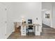 Bright home office featuring a built-in desk with drawers and wooden floors at 605 12Th N Ave, St Petersburg, FL 33701