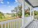 Enjoy the beautiful outdoors from this porch with scenic views of a green field, creating a serene and peaceful atmosphere at 605 12Th N Ave, St Petersburg, FL 33701