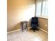 Simple office space with a window, desk, and chair, ideal for remote work or study at 7044 Everest St, Spring Hill, FL 34606