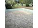 Paver patio surrounding home at 7044 Everest St, Spring Hill, FL 34606