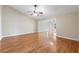 Living Room with vaulted ceiling, hardwood floors, and natural lighting at 759 Timuquana Ln, Palm Harbor, FL 34683