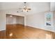 Bright living room features hardwood floors, high ceilings, and natural light at 759 Timuquana Ln, Palm Harbor, FL 34683