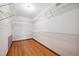 Walk-in closet with wood flooring and wire shelving at 759 Timuquana Ln, Palm Harbor, FL 34683