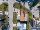 Bird's eye view of property with mature trees, expansive lot, and circular driveway at 809 59Th Ave, St Pete Beach, FL 33706