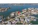 Breathtaking aerial view of waterfront home offering stunning bay views at 809 59Th Ave, St Pete Beach, FL 33706