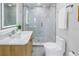 Modern bathroom showcasing a marble vanity, elegant fixtures, and a glass-enclosed shower at 809 59Th Ave, St Pete Beach, FL 33706