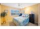 Bright bedroom with large window and neutral color scheme boasts a comfortable atmosphere at 903 Pinellas Bayway S # 307, Tierra Verde, FL 33715