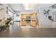 Well-lit kitchen with wooden cabinetry, stainless steel appliances and patterned floor tiles at 9234 Duffer Ct, Hudson, FL 34667