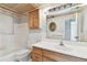 Bathroom featuring a vanity with a large mirror, toilet and shower-tub combination at 969 Britton St, Largo, FL 33770