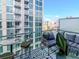 Cozy balcony with stylish seating, offering a relaxing outdoor space with city views at 111 N 12Th St # 1820, Tampa, FL 33602