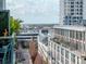 Balcony view of downtown neighborhood with palm trees and high-rise condominiums at 111 N 12Th St # 1820, Tampa, FL 33602