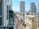 Urban landscape featuring modern apartments and condominiums, set against a bright blue sky at 111 N 12Th St # 1820, Tampa, FL 33602