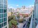 Balcony view showcasing city skyline with trees, a playground, and outdoor view at 111 N 12Th St # 1820, Tampa, FL 33602