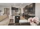 A spacious kitchen featuring dark cabinetry, granite countertops, and stainless steel appliances at 11717 Navajo Sandstone St, Riverview, FL 33579