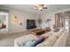 Bright living room featuring neutral walls, modern furniture and decor at 11717 Navajo Sandstone St, Riverview, FL 33579