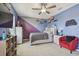 bedroom painted with two-tone wall and ceiling fan at 12326 Dora Trl, Parrish, FL 34219