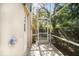 Convenient outdoor shower attached to the screen enclosed patio of the residence at 1370 Pinellas Rd, Belleair, FL 33756