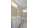 Bathroom showcasing a vanity, mirror, bath tub, and a shower at 14350 Hill Country Rd, Brooksville, FL 34614