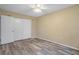 Bedroom showing the flooring and cream colored walls at 14350 Hill Country Rd, Brooksville, FL 34614