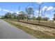 Sprawling lot, partially fenced, offering both seclusion and ease of access with roadside convenience at 14350 Hill Country Rd, Brooksville, FL 34614