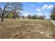 Vast, open lot provides abundant space, ideal for building or recreation in a serene, tree-lined setting at 14350 Hill Country Rd, Brooksville, FL 34614