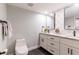 This bathroom features dual sinks and vanities with modern black hardware at 14700 Seminole Trl, Seminole, FL 33776