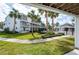 Beautiful view of the community pool area surrounded by lush greenery at 14700 Seminole Trl, Seminole, FL 33776