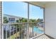 Screened balcony overlooking the pool with views of the community at 14700 Seminole Trl, Seminole, FL 33776