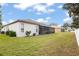 Nice sized backyard with the home's screened-in lanai at 1604 Harvest Grove Ct, Valrico, FL 33596