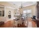 Bright dining area featuring a stylish chandelier and a table with seating for four at 1604 Harvest Grove Ct, Valrico, FL 33596