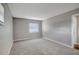 Bedroom featuring neutral paint and carpet, and great natural light from the window at 16106 Blackbeard Ln, Hudson, FL 34667