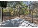 Screened in porch provides an outdoor space with natural views at 16106 Blackbeard Ln, Hudson, FL 34667