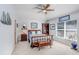 Bright, spacious bedroom featuring vaulted ceilings, and a ceiling fan at 19131 Weymouth Dr, Land O Lakes, FL 34638