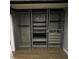 Open closet with shelving and drawers, great for bedroom storage at 2301 46Th S St, St Petersburg, FL 33711