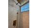 Shower head with modern fixtures and overhead light at 2301 46Th S St, St Petersburg, FL 33711