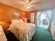 This bright bedroom boasts a sliding glass door to the patio at 2434 Australia E Way # 44, Clearwater, FL 33763