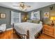 Cozy bedroom with hardwood floors, ample natural light, and classic furnishings at 2885 18Th N Ave, St Petersburg, FL 33713