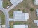 An aerial view of a single-story house with a well-maintained roof at 36806 Niles Dr, Zephyrhills, FL 33542