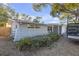 Home's stone facade and front yard's landscaping at 4077 Ramona Dr, Spring Hill, FL 34606