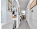 Hallway view with a glimpse into the kitchen and living room at 5106 Tanner Rd, Spring Hill, FL 34609