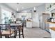 Spacious kitchen and dining area with natural light and stainless steel appliances at 5106 Tanner Rd, Spring Hill, FL 34609